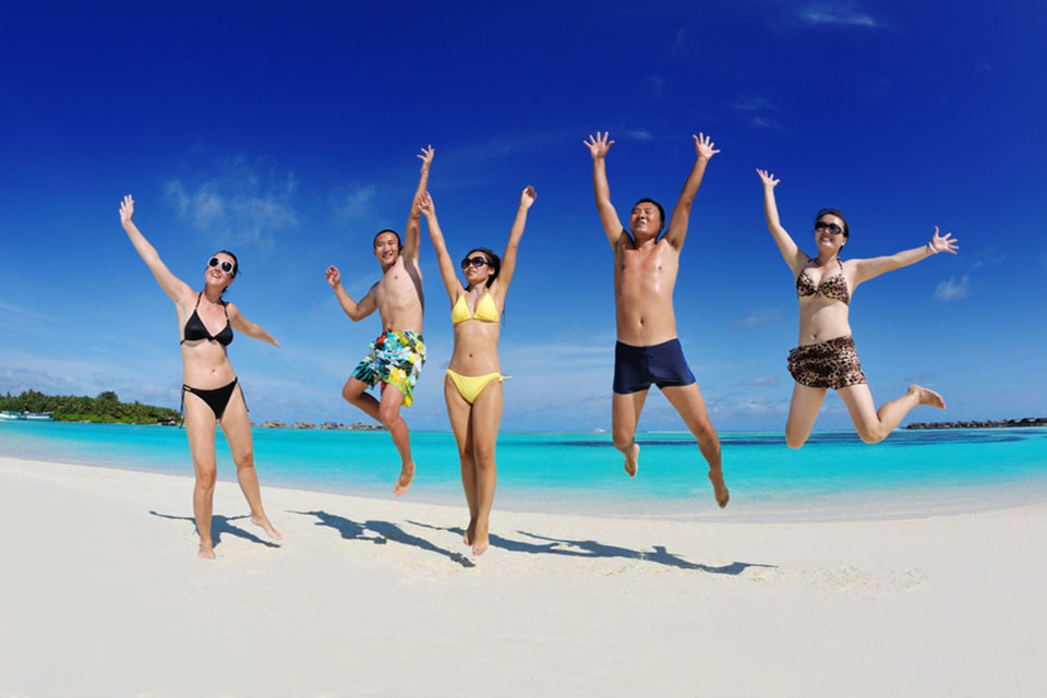 Happy people am Strand von Cancun